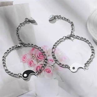 Yin and Yang pararmbånd i rustfritt stål.